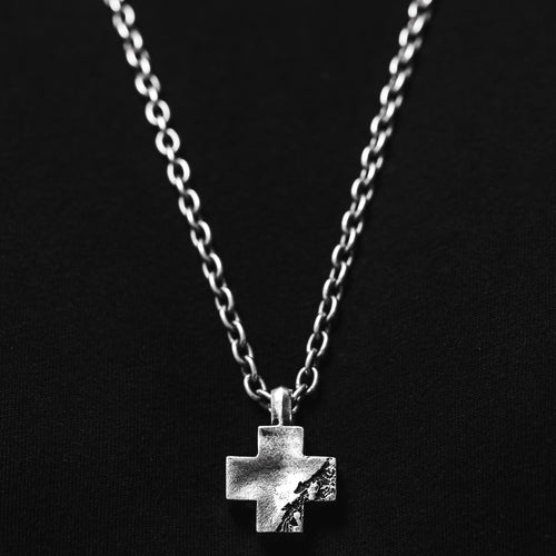 Silver Cross Logo Pendant angle view